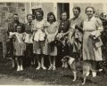 Left side; Bridget Agnes (O'Sullivan) Wild, her granddaughter Elizabeth (Betty) Marie Etue and six local Bayfield ladies taken circa 1945